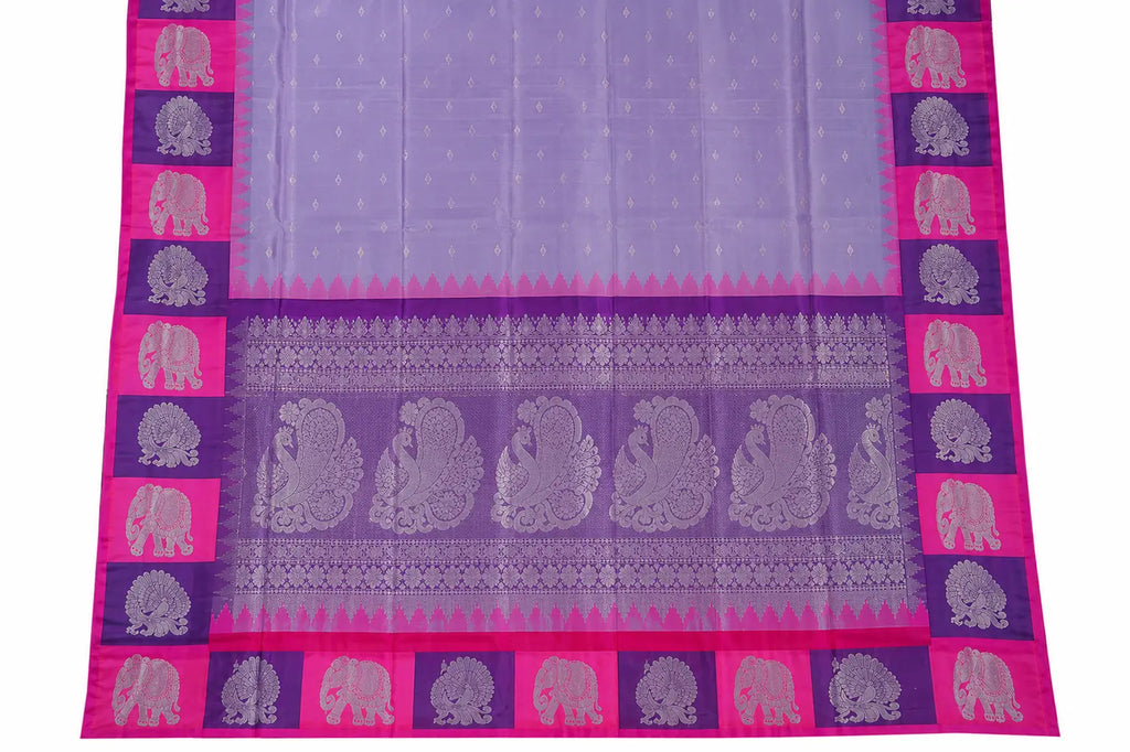 Lavender silk saree with magenta border and elephant motifs