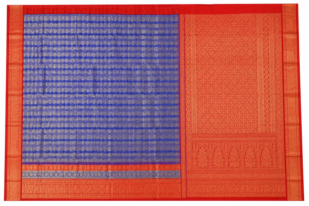 Kanchipuram silk saree with blue body, red border, and woven gold motifs