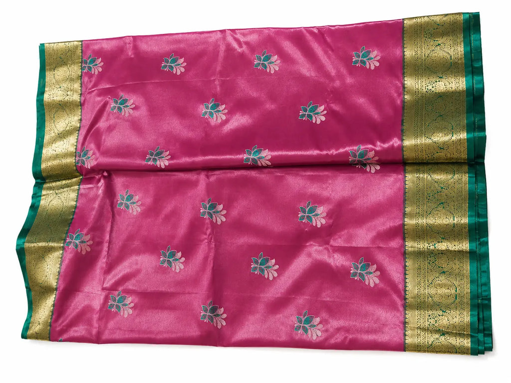 Pink pattu saree, pink with teal floral motifs and teal-gold border