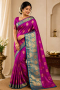 Magenta silk saree with teal contrast border and gold motifs
